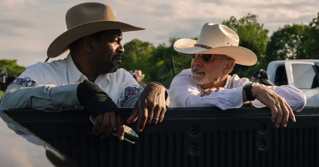 Mykelti Williamson e o diretor Jon Avnet conversam durante as filmagens de O Último Rodeio (The Last Rodeo).