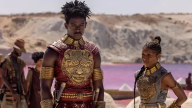 Damson Idris e Cynthia Erivo em cena de Filhos de Sangue e Osso (2027), usando armaduras cerimoniais em um cenário inspirado na cultura africana.