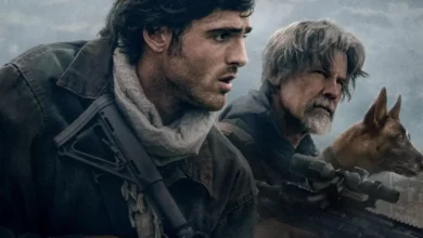Imagem promocional do filme Ponto Sem Retorno (2026) mostra Jacob Elordi e Josh Brolin armados ao lado de um cão, observando o horizonte em um cenário pós-apocalíptico.