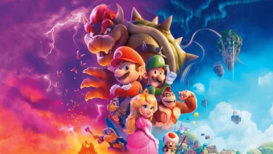 Imagem promocional do filme "Super Mario Bros. O Filme" (2023), mostrando os personagens Mario, Luigi, Princesa Peach, Donkey Kong, Toad e Bowser em um cenário colorido que mistura céu azul com ilhas flutuantes e nuvens de trovão. Arte vibrante com elementos clássicos dos jogos da Nintendo.