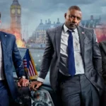 Cena de divulgação do filme Chefes de Estado (2025) com John Cena, Idris Elba e Priyanka Chopra Jonas em frente a explosões e o Big Ben ao fundo.
