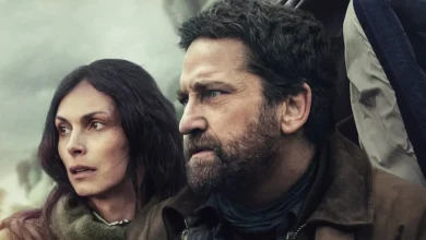 Gerard Butler e Morena Baccarin em imagem promocional do filme Destruição Final 2: Migration, sequência do thriller apocalíptico lançado em 2026.