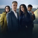 Minnie Driver, Alfred Enoch, Ruth Jones e James Nesbitt em cena da série Custe O Que Custar (2026), produção de suspense dramático ambientada em uma pequena cidade.