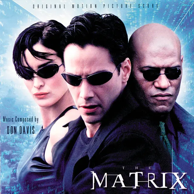 Capa da trilha sonora de Matrix (1999) Capa da trilha sonora de Matrix (1999) com Keanu Reeves como Neo, Carrie-Anne Moss como Trinity e Laurence Fishburne como Morpheus.