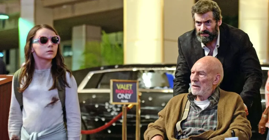 Elenco de Logan 2017 reunido em uma cena do filme com personagens em um ambiente interno