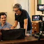 Wagner Moura e Kleber Mendonça Filho nas filmagens de O Agente Secreto