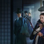 Imagem promocional da série coreana "Querido Hongrang", da Netflix, com Lee Jae-wook em destaque ao lado de atriz com arco e flecha, em figurino tradicional