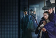Imagem promocional da série coreana "Querido Hongrang", da Netflix, com Lee Jae-wook em destaque ao lado de atriz com arco e flecha, em figurino tradicional