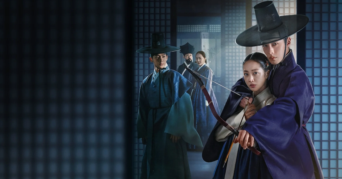 Imagem promocional da série coreana "Querido Hongrang", da Netflix, com Lee Jae-wook em destaque ao lado de atriz com arco e flecha, em figurino tradicional