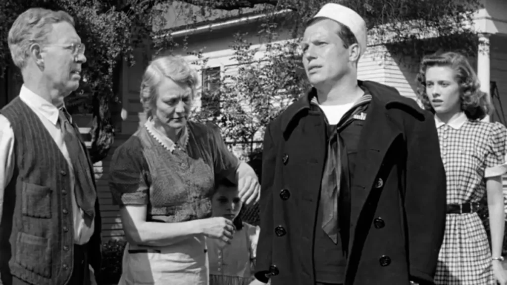 trajetoria harold russell Walter Baldwin, Minna Gombell, Cathy O'Donnell e Harold Russell em cena comovente do clássico Os Melhores Anos de Nossas Vidas (1946), que retrata os desafios enfrentados pelos veteranos após a Segunda Guerra Mundial.