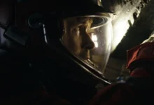 Ryan Gosling com traje espacial em Devoradores de Estrelas
