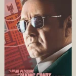 Pôster do filme "Em Ritmo de Fuga" (Baby Driver) com Kevin Spacey usando óculos escuros.