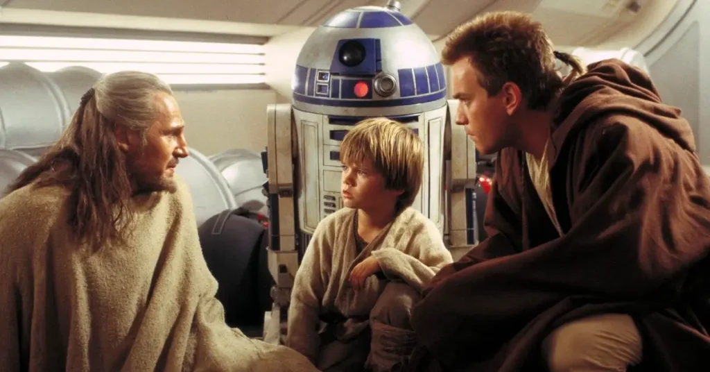 jake lloyd em star wars Qui-Gon Jinn, Anakin Skywalker e Obi-Wan Kenobi ao lado de R2-D2 em cena de Star Wars: Episódio I – A Ameaça Fantasma (1999)