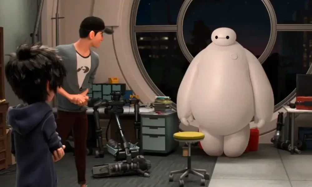 Baymax, Hiro e Tadashi Hamada no laboratório em cena do segundo trailer de Big Hero 6