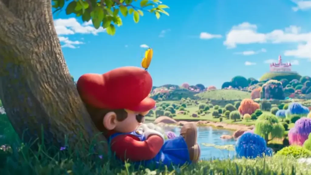 Mario observa paisagem colorida do Reino dos Cogumelos em cena oficial de Super Mario Galaxy O Filme 2026
