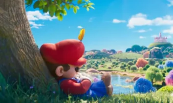 Mario observa paisagem colorida do Reino dos Cogumelos em cena oficial de Super Mario Galaxy O Filme 2026
