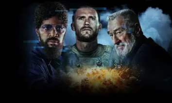 Pôster vertical do filme de ação Soldado de Chumbo (Tin Soldier). Na imagem, em um fundo escuro e em meio a uma explosão no centro inferior, estão em destaque e justapostos os atores principais: à esquerda, Jamie Foxx, de barba e óculos; ao centro, Scott Eastwood, com expressão intensa e vestimenta militar; e à direita, Robert De Niro, com barba grisalha e olhar focado. Uma névoa ou fumaça envolve os personagens, com efeitos de falha digital (glitch) azul e vermelho na parte superior. A imagem evoca ação, suspense e a presença de três grandes estrelas de Hollywood.