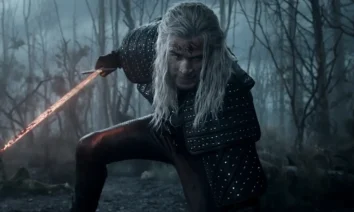 Liam Hemsworth como Geralt de Rívia em cena sombria da quarta temporada de The Witcher, série da Netflix.