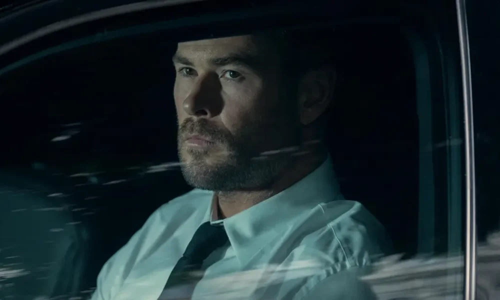 trailer caminhos do crime 2026 Chris Hemsworth em cena de Caminhos do Crime (2026), thriller dirigido por Bart Layton.