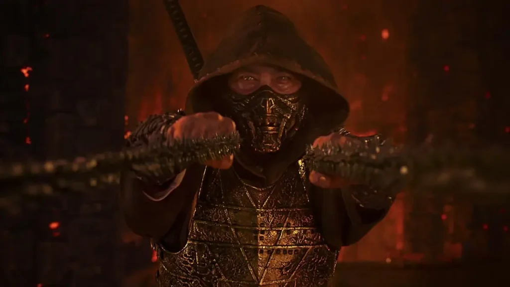 Scorpion empunhando kunai dupla em meio a chamas e brasas em Mortal Kombat 2, filme aguardado de 2026 da Warner Bros