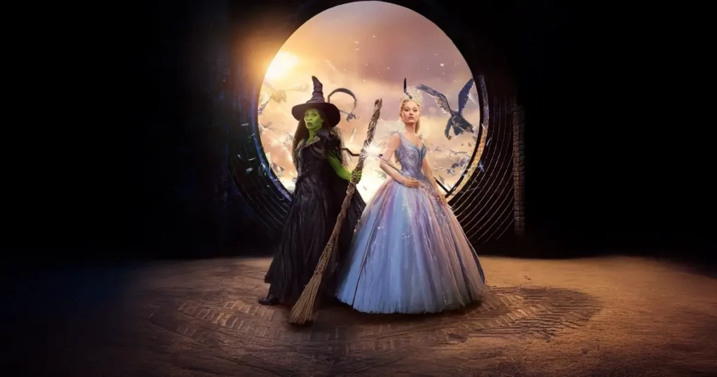 oscar 2026 wicked parte 2 Cynthia Erivo como Elphaba com pele verde e vassoura ao lado de Ariana Grande como Glinda em vestido azul claro em Wicked Parte 2, possível candidato ao Oscar 2026