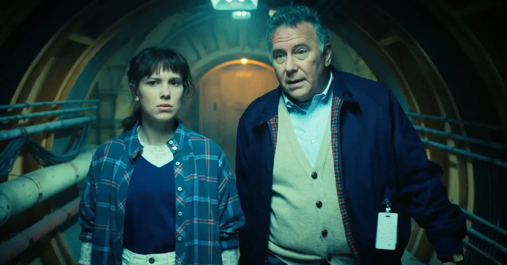 stranger things 4 episodio 5 projeto nina Cena de Stranger Things 4 mostrando Eleven e o Dr. Owens dentro da instalação secreta do Projeto Nina no deserto de Nevada.