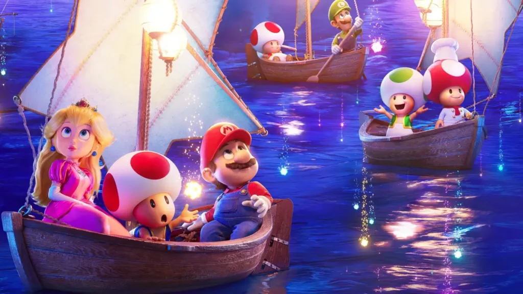 Mario, Princesa Peach e Toads navegando em barcos com velas por águas iluminadas em Super Mario Galaxy O Filme (2026), animação da Universal Pictures