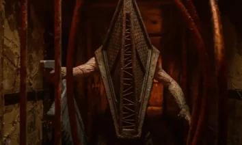 Pyramid Head em corredor macabro em cena de Terror em Silent Hill: Regresso Para o Inferno (2026), dirigido por Christophe Gans.