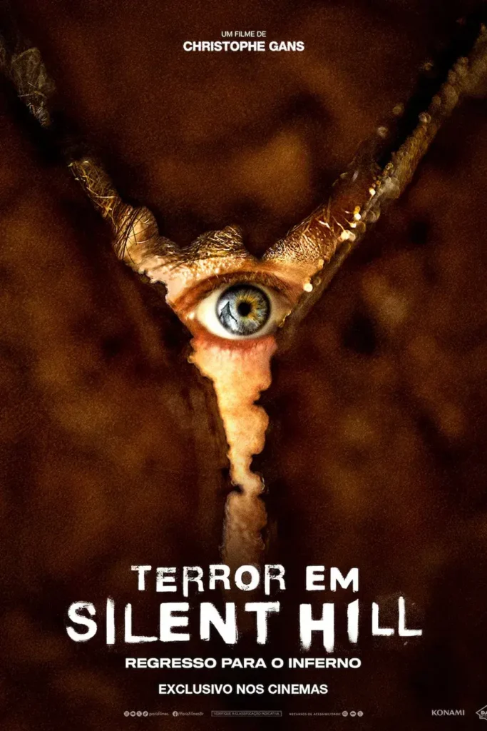 Pôster oficial do filme Terror em Silent Hill Regresso Para o Inferno (2026), dirigido por Christophe Gans. A imagem mostra um olho humano azul fixo, visto através de uma grande rachadura ou abertura marrom em formato de V, com o título do filme em destaque na parte inferior.
