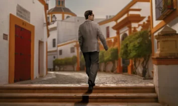 berlim e a dama com arminho netflix Pedro Alonso caminha por uma rua europeia na divulgação de Berlim e a Dama com Arminho (2026), nova temporada derivada de La Casa de Papel, que estreia em 15 de maio de 2026 na Netflix.