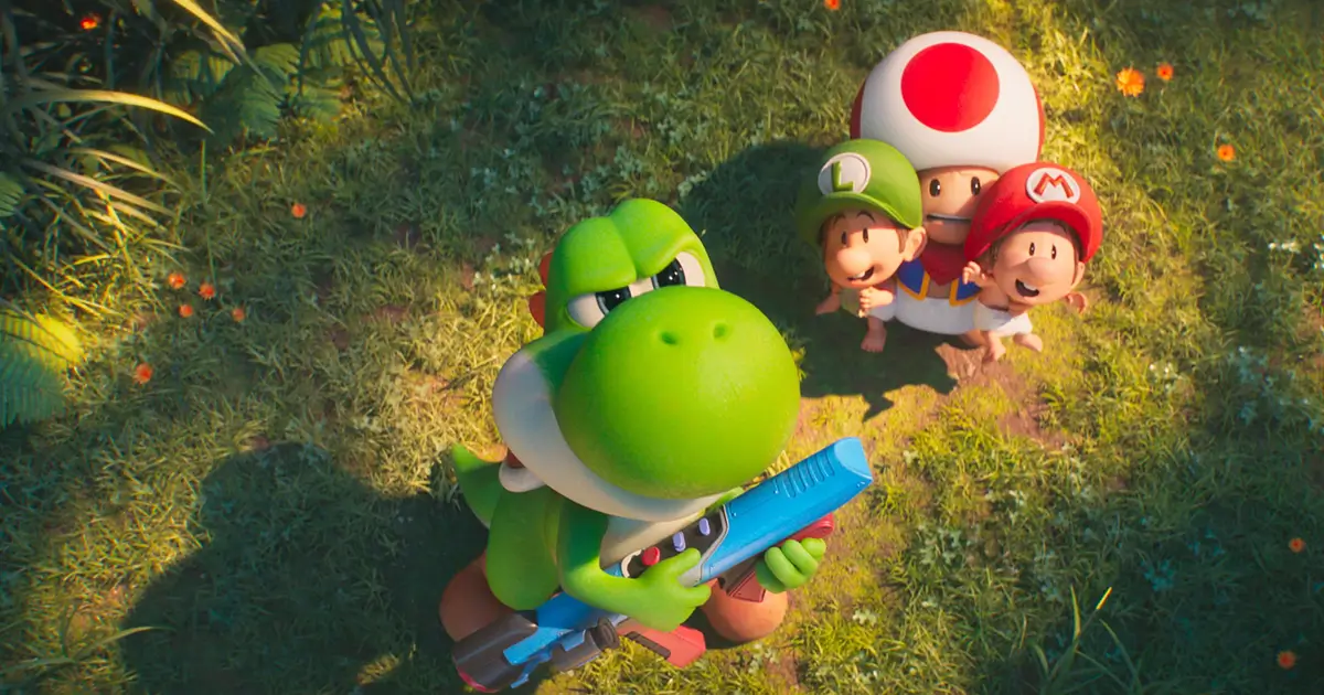 Yoshi segurando uma arma laser enquanto Baby Mario, Baby Luigi e Toad observam o céu em cena do novo trailer de Super Mario Galaxy: O Filme.