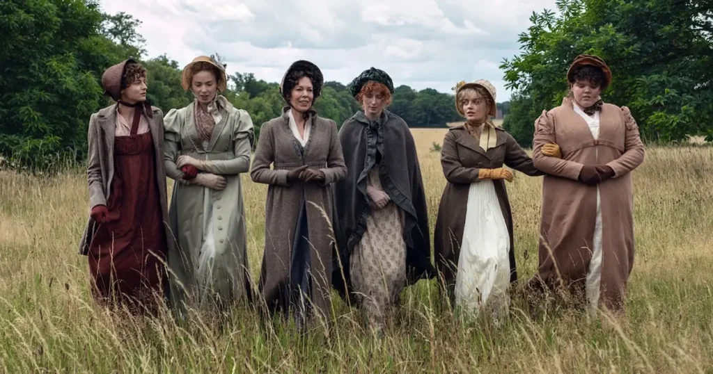 Emma Corrin, Freya Mavor, Hopey Parish, Rhea Norwood, Hollie Avery e Olivia Colman em cena de Orgulho e Preconceito (Netflix)