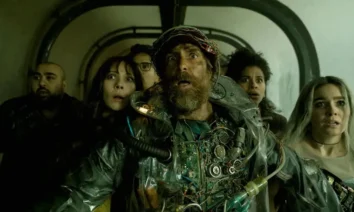 Sam Rockwell, Michael Peña, Juno Temple, Haley Lu Richardson, Asim Chaudhry e Zazie Beetz em cena de Boa Sorte, Divirta-se, Não Morra (2025)