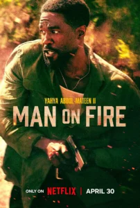 poster homem em chamas serie Yahya Abdul-Mateen II em Homem em Chamas (2026), série de ação da Netflix, segurando arma em cena intensa cercada por fogo