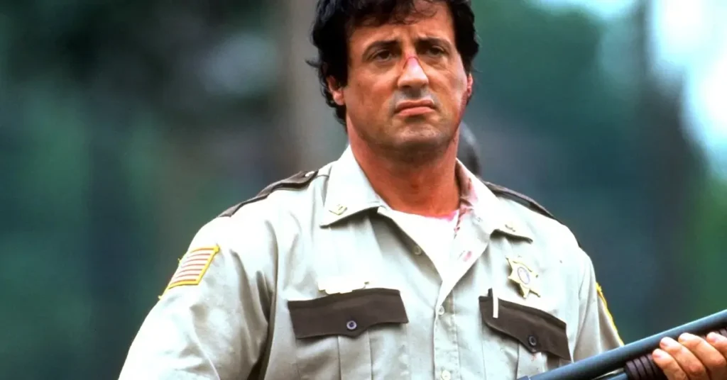 Sylvester Stallone como Freddy Heflin em Cop Land (1997) evidenciando transformação física e desgaste emocional do personagem