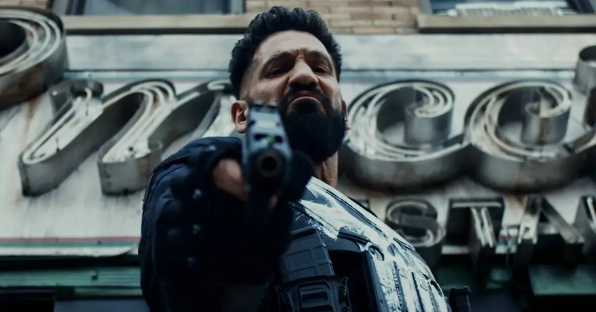 o justiceiro uma ultima morte 2026 Jon Bernthal como O Justiceiro apontando arma em cena de O Justiceiro Uma Última Morte (2026)
