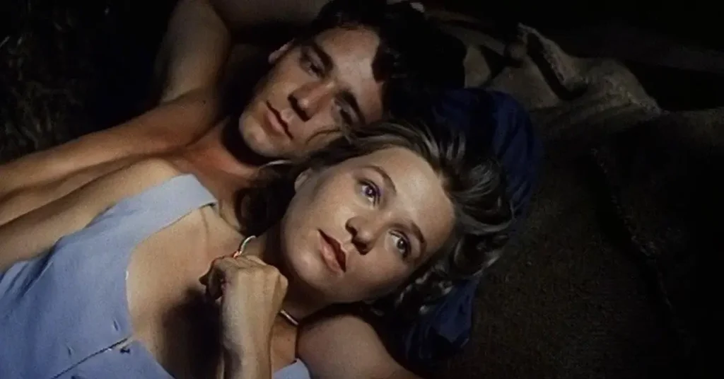Russell Crowe e Danielle Spencer em cena do filme The Crossing (1990), primeiro papel de destaque do ator no cinema