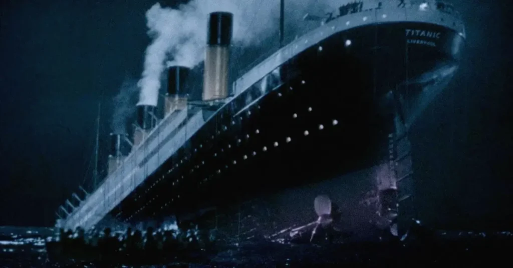 Cena do filme S.O.S. Titanic (1979), mostrando o navio parcialmente submerso durante o naufrágio