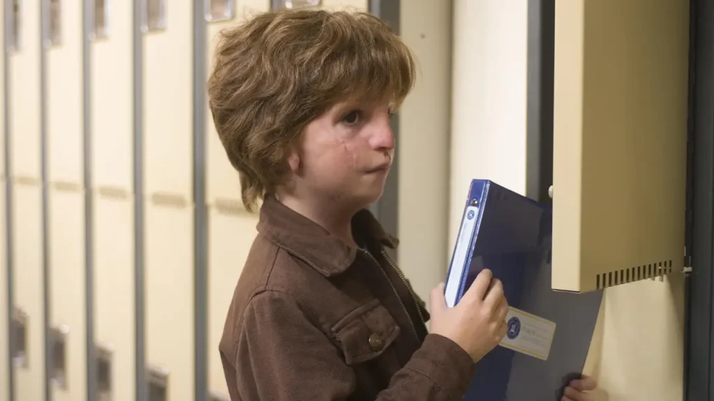 Jacob Tremblay como August Pullman em Extraordinário (2017), drama sobre empatia, bullying e aceitação.