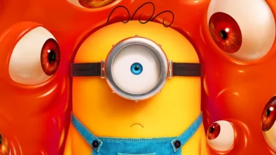 trailer final de minions e monstros Minion cercado por olhos gigantes em cena do trailer final de Minions e Monstros