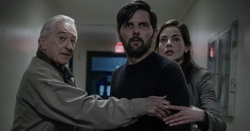 Robert De Niro, Adam Scott e Michelle Monaghan em cena do suspense O Homem que Sussurra, um dos filmes da Netflix em agosto de 2026.
