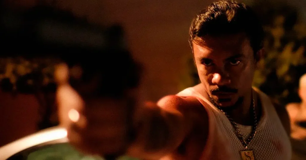 : Xamã em cena de Cinco Tipos de Medo (2026), interpretando Sapinho, personagem envolvido em uma trama de violência e conflitos na periferia de Cuiabá. O filme dirigido por Bruno Bini está entre os 15 longas brasileiros na disputa para representar o Brasil no Oscar 2027.