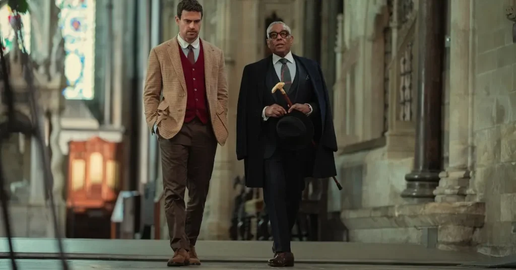 Theo James como Eddie Horniman e Giancarlo Esposito como Stanley Johnston em cena de Magnatas do Crime: Temporada 2, série da Netflix.