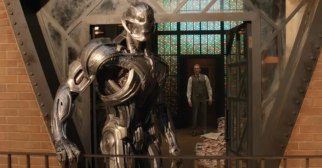 Ultron aparece em frente a um prédio enquanto um homem observa ao fundo em cena de VisionQuest, série da Marvel no Disney+