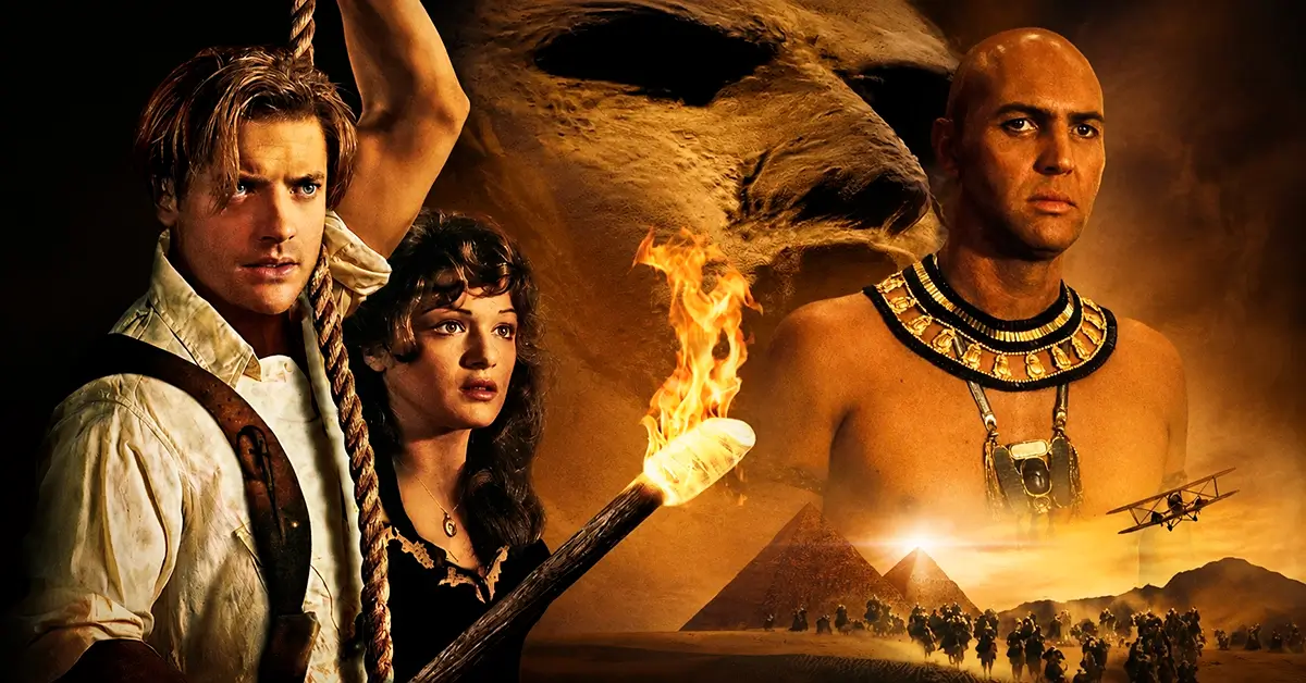 Elenco de A Múmia (1999) reunido em arte cinematográfica com Brendan Fraser, Rachel Weisz e Arnold Vosloo no deserto egípcio