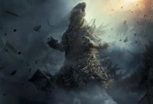 Godzilla em cena de ação de Godzilla Minus Zero, cercado por destroços, fumaça e tempestades durante um ataque devastador