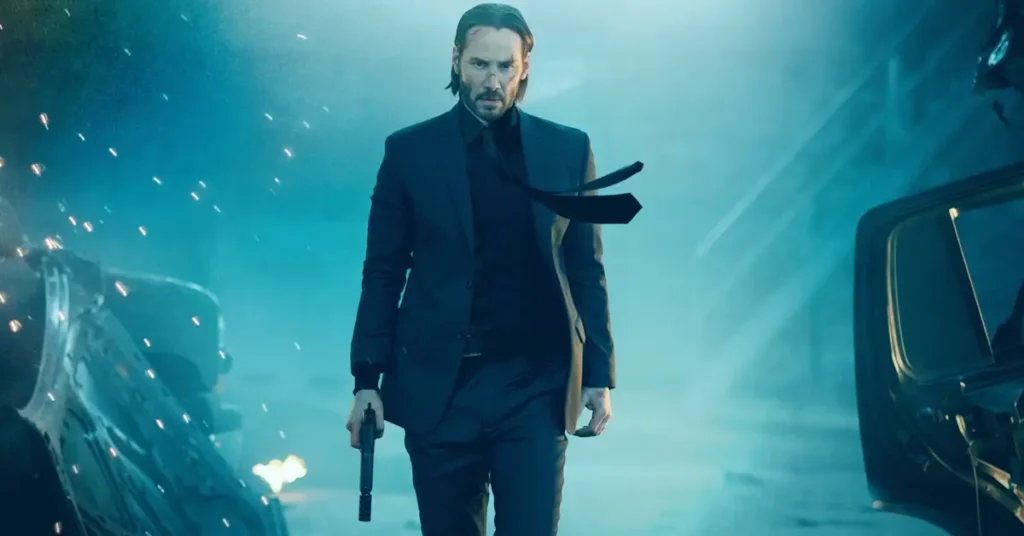 Keanu Reeves como John Wick em cena de ação da franquia