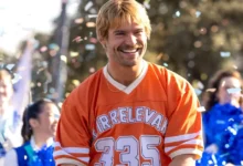David Corenswet como John Tuggle em A Vida Por Um Sonho (Mr. Irrelevant)