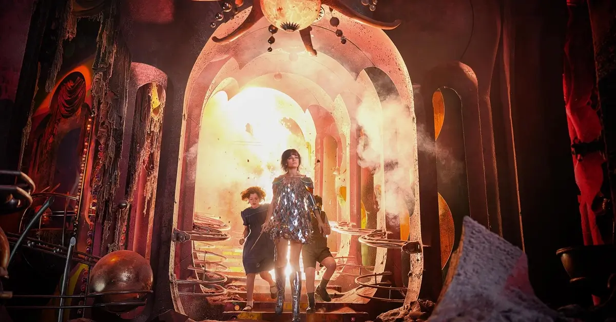 David McKenna, Beatrice Campbell, and Emma Mackey in Narnia: The Magician’s Nephew (2027), standing inside a glowing, smoke-filled magical structure.
