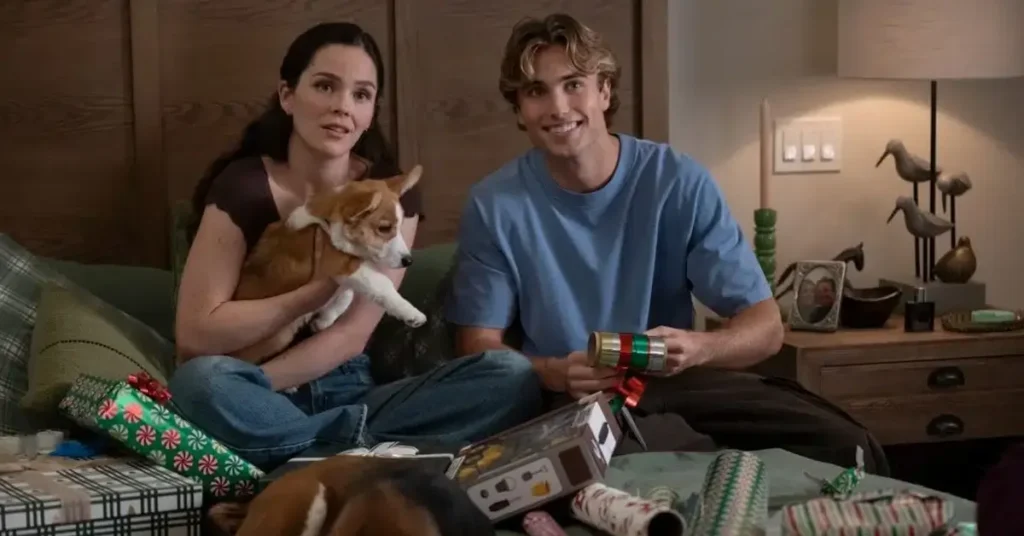 Brooke Lena Johnson como Ello e Ethan Loomis como Sean ao lado dos cães Ruby, um filhote de Corgi, e Winstead, um Basset Hound, em cena de O Natal Perfeito de um Cachorro (A Dog’s Perfect Christmas), filme da Netflix.